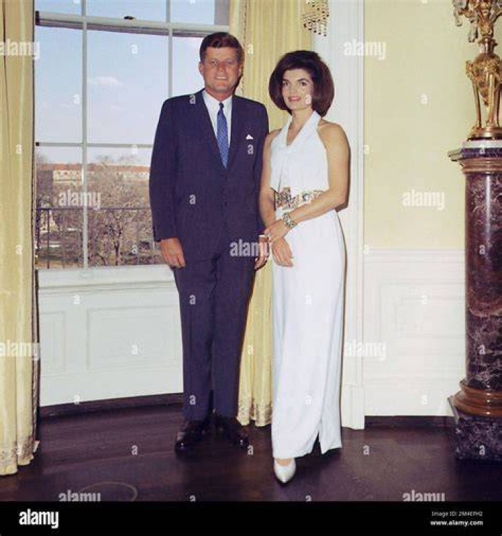 Kennedy, left, with his newlywed third wife, Joan McCarthy