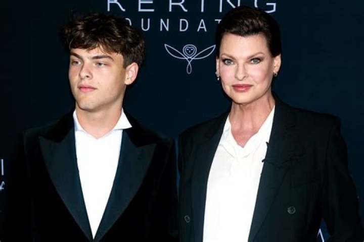 Linda Evangelista and son Augustin twin in matching suits at 2nd Annual