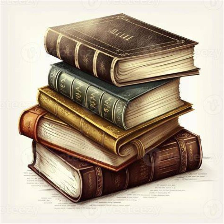 some books are stacked on top of each other with the title written in